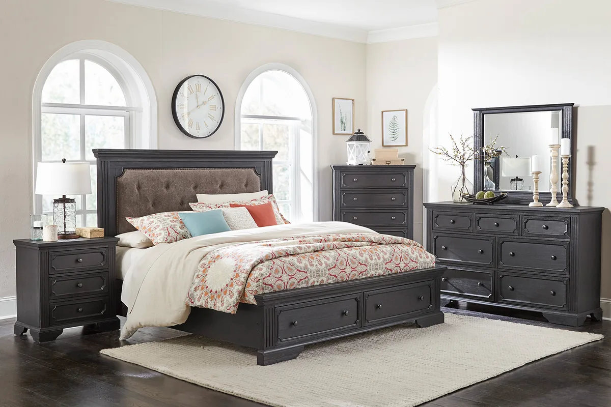 Charcoal storage bed with an upholstered headboard, nightstand, chest and dresser